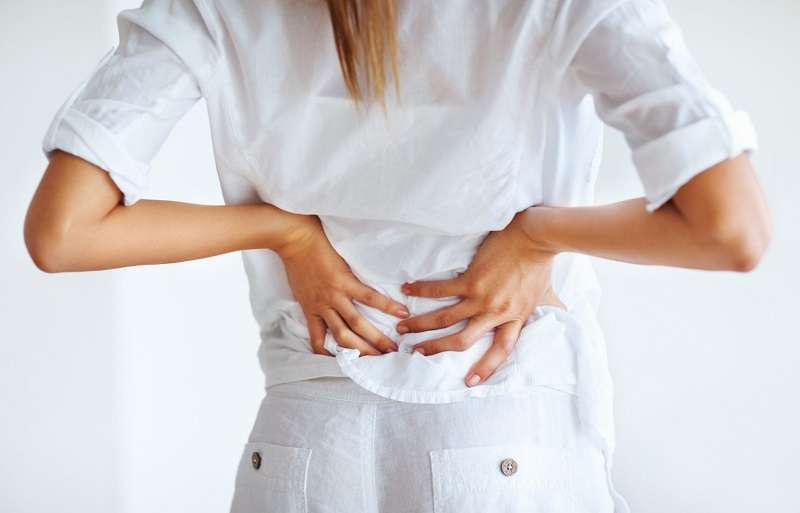 Triệu chứng gai cột sống lưng điển hình là đau vùng thắt lưng Triệu chứng gai cột sống lưng điển hình là đau vùng thắt lưng